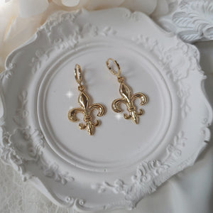 Fleur-De-Lis Huggies Earrings - Gold