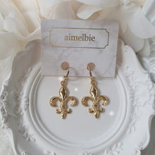 Load image into Gallery viewer, Fleur-De-Lis Huggies Earrings - Gold