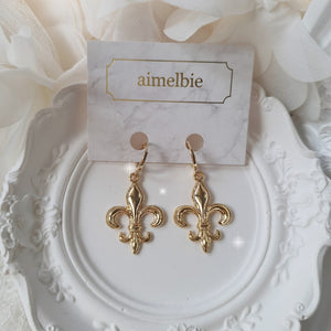 Fleur-De-Lis Huggies Earrings - Gold