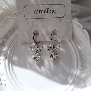 [IU Earrings] Dainty Heart Crystal and Ribbon Huggies Earrings - Silver Color