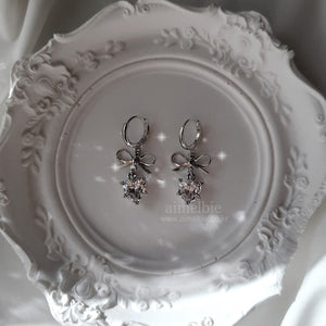 [IU Earrings] Dainty Heart Crystal and Ribbon Huggies Earrings - Silver Color
