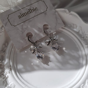 [IU Earrings] Dainty Heart Crystal and Ribbon Huggies Earrings - Silver Color