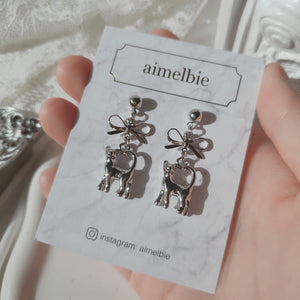 Kitty and Bow Earrings - Silver Color