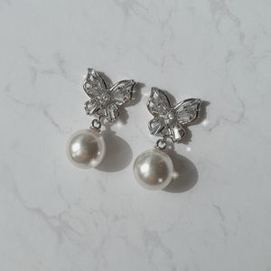 Butterfly and pearl earrings