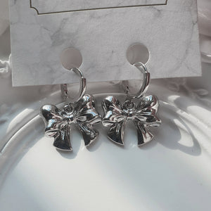 Adorable Ribbon Huggies Earrings - Silver