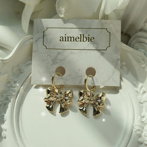 Adorable Ribbon Huggies Earrings - Gold