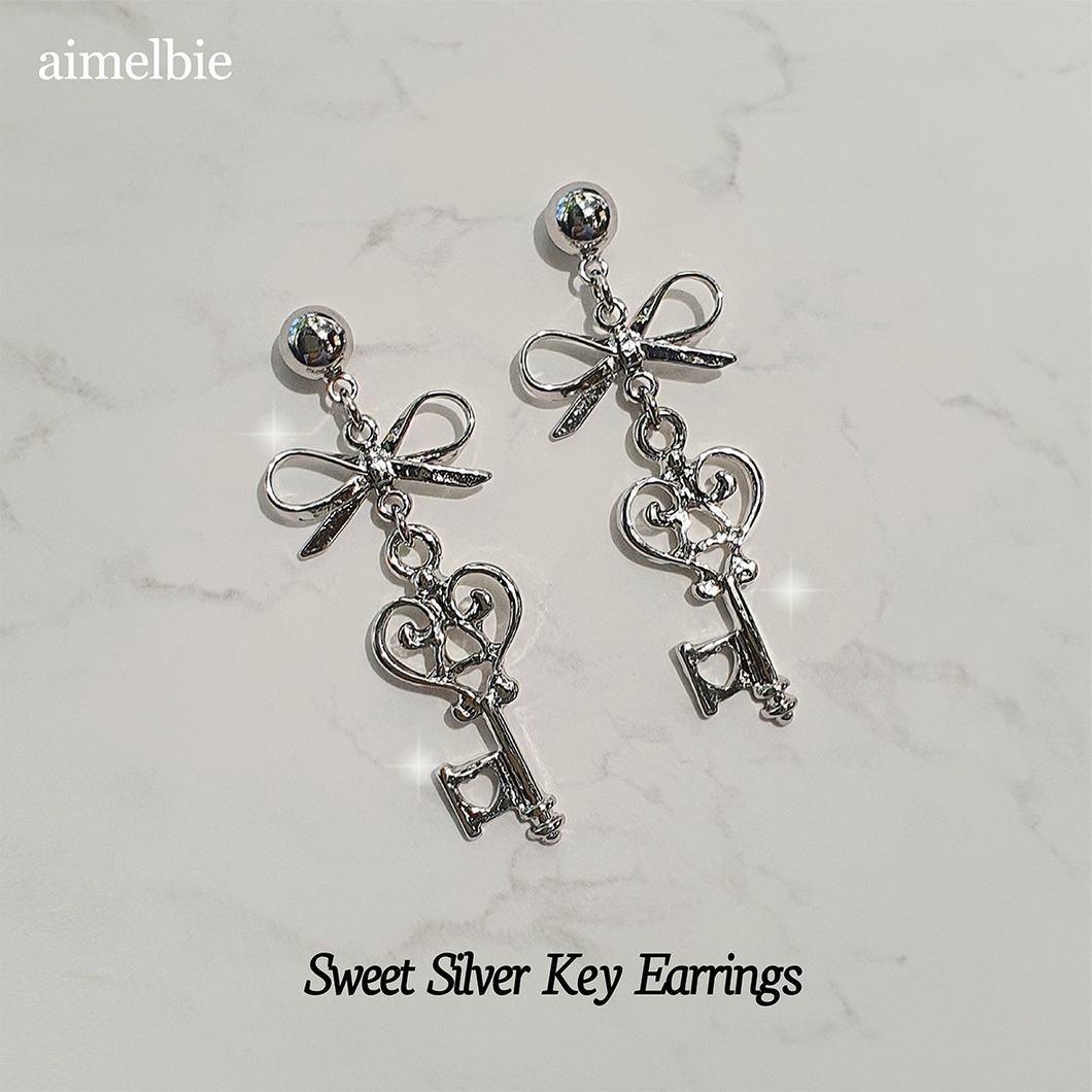 Silver key earrings clearance